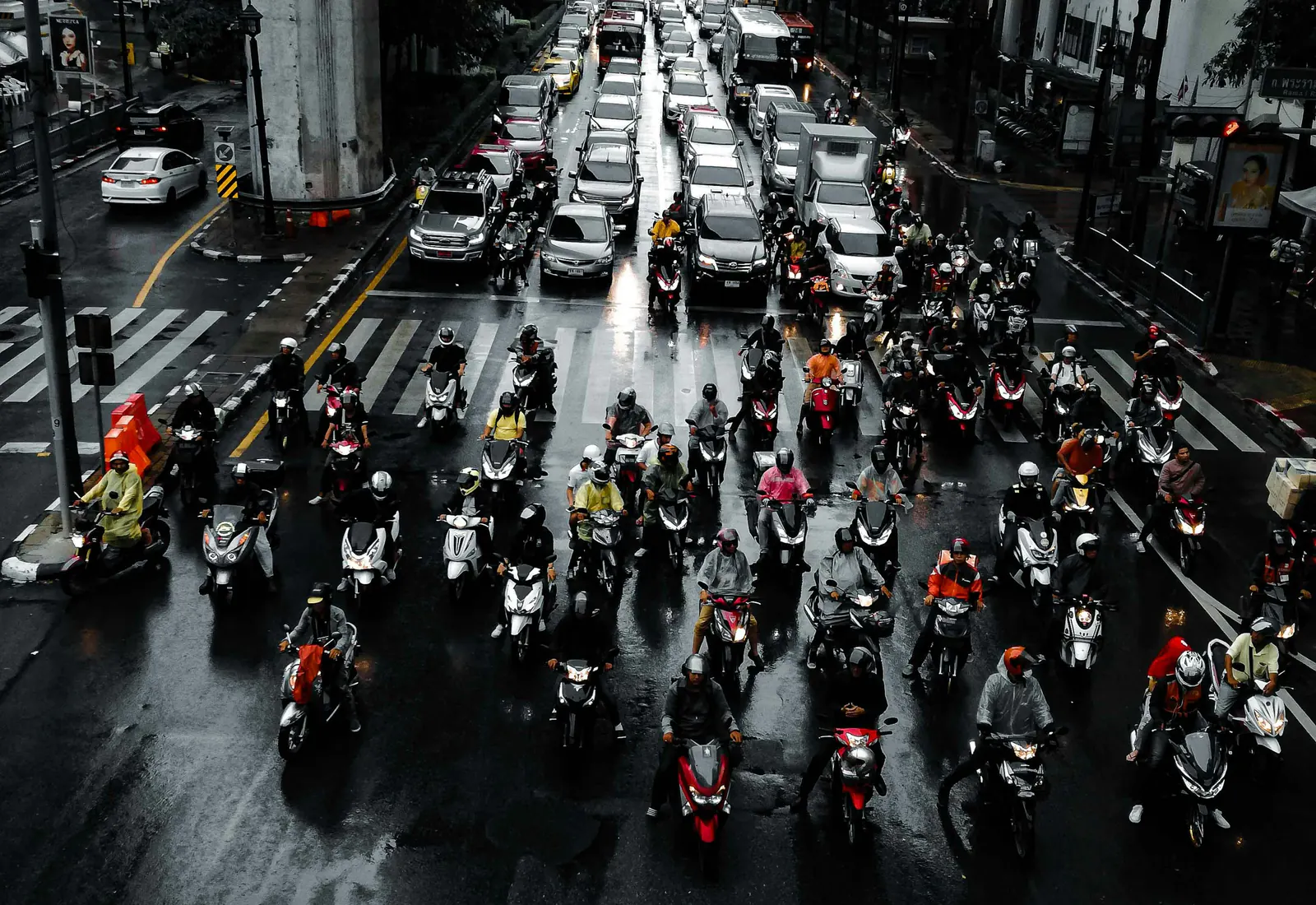 People crossing a pedestrian street in Bangkok